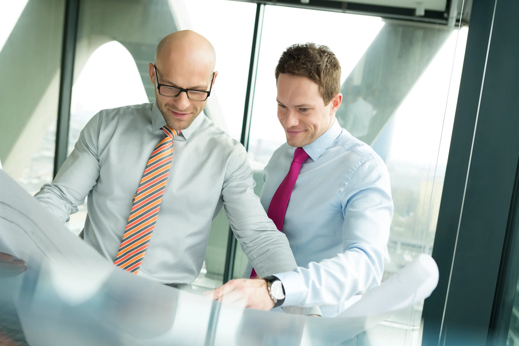 fairfield stern tokto japan two businessmen in office looking at blueprint photo.webp